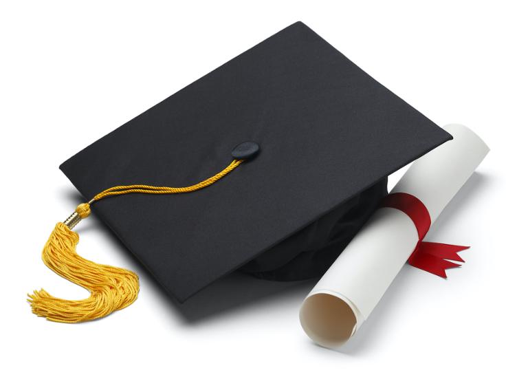 shutterstock_144197953.jpg Cyber security degree folded up sitting next graduation cap