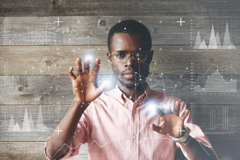 shutterstock_446562424.jpg Data analyst working on analyzing data for project